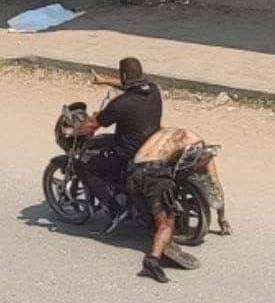 גרירת גופה ישראלית בלי ראש על אופנוע לכיוון עזה 7-10-2023